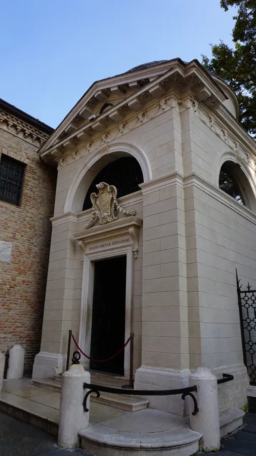 Dante Alighieri's Tomb in Ravenna, inscribed with 'DANTIS POETAE SEPULCRUM' above its entrance.