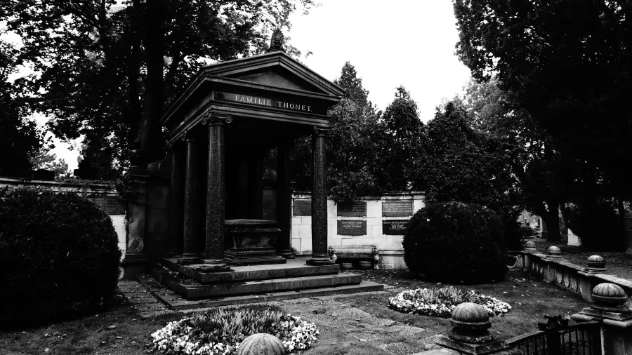 The neoclassical Thonet family mausoleum in a cemetery inscribed with FAMILIE THONET.
