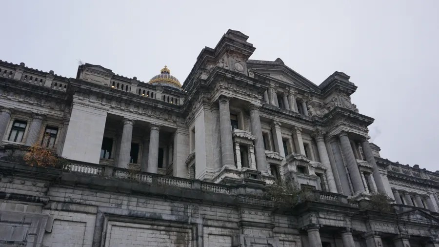 Neoclassical facade and gold dome of the Palace of Justice in Brussels