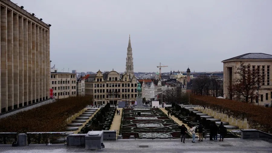 Panoramic view of Mont des Arts garden with the Brussels Town Hall spire in the background.