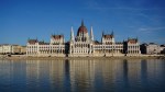 The Hungarian Parliament Building in Budapest reflected in the Danube River