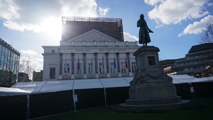 Exterior of THEATRE ROYAL OPERA ROYAL DE WALLONIE with a large statue on a pedestal