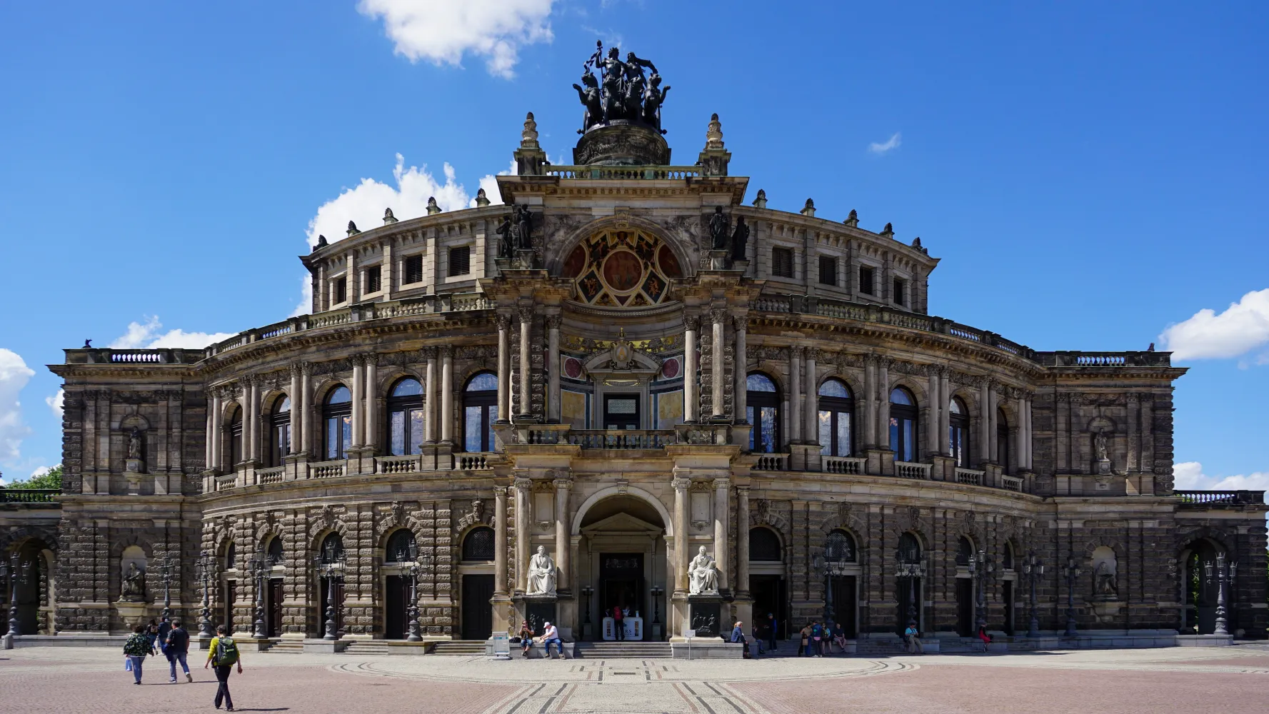 Semperoper opera house in Dresden with historic architecture and blue sky